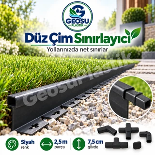 Siyah düz çim sınırlayıcı ile çim ve dekoratif taş yolun ayrıldığı bahçe uygulaması.